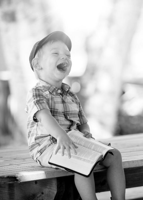 Child Reading from a Bible