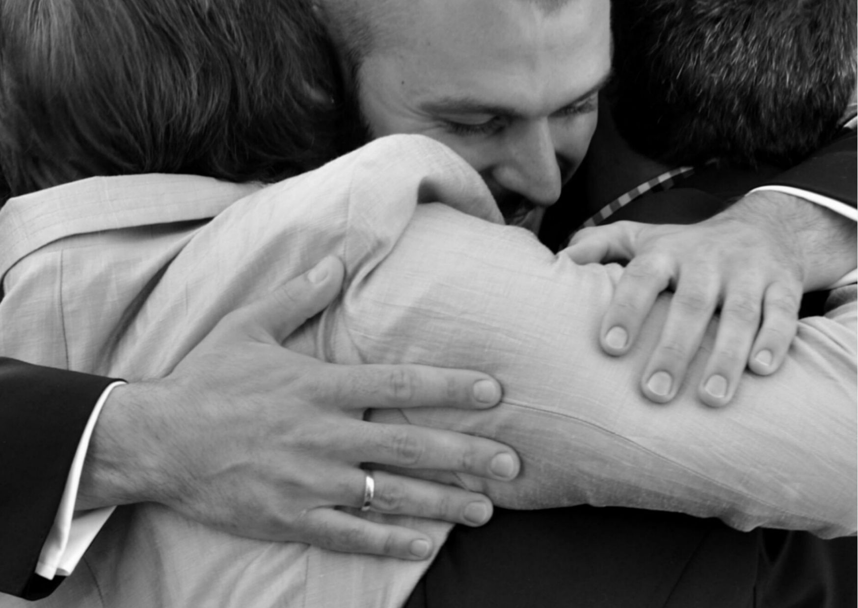 Greeter Embracing Couple